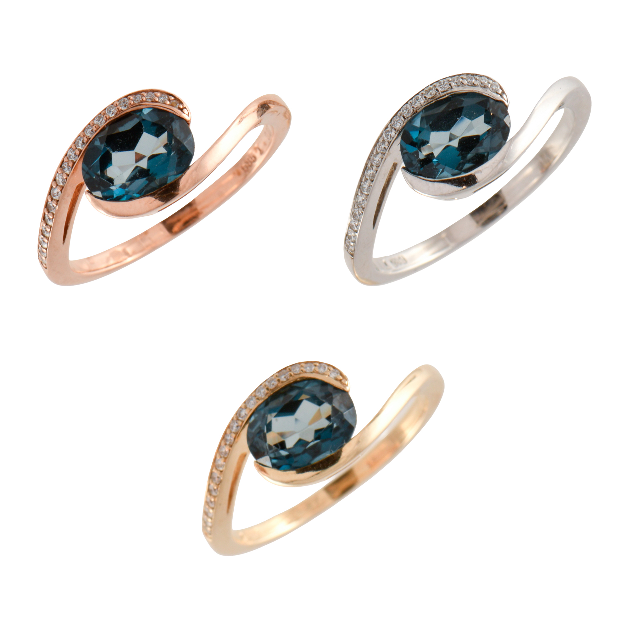 Lote de tres anillos con cuarzo azul y diamantes.