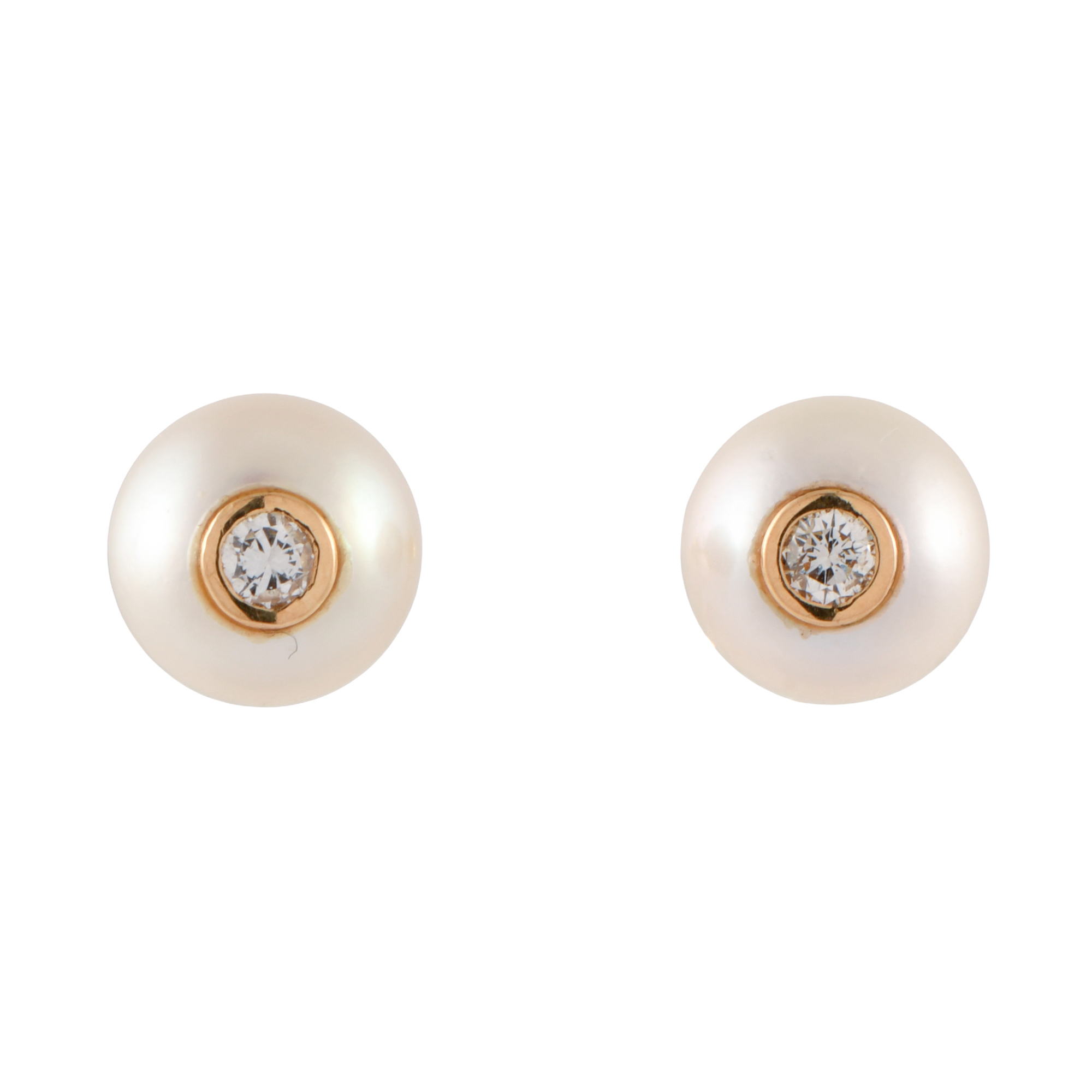 Pendientes con perlas y diamantes.