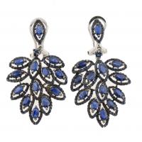 84-Silver with oval and round-cut sapphires of an approx. weight of 9,45 ct. French back. 13,9 gr.