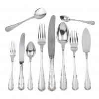 49-Hallmarked by the Oriol jewelers. Chiselled with the innitials "G.F.".It comprises 114 table cutlery items and 13 service utensils. Total 127 pieces.5.102 gr.