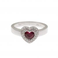 176-White gold with central heart rubi and brilliant-cut diamonds of an aproximate weight of 0,20 ct.Ring size 17 mm.5,7 gr.