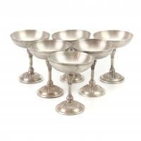 47-SIX SPANISH SILVER CAVA COUPES, MID C20th.