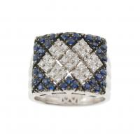 210-WIDE DIAMOND AND SAPPHIRE RING.