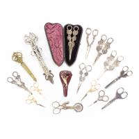 678-LOT OF FIFTEEN PAIRS OF SCISSORS AND A CIGAR CUTTER, C19th.