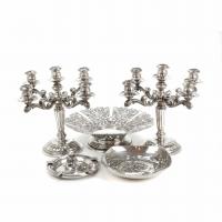 8-PAIR OF SPANISH SILVER CANDELABRA AND THREE CENTREPIECES, MID 20TH CENTURY.