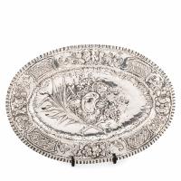 6-ORNAMENTAL TRAY IN EMBOSSED SILVER, PROBABLY 19TH CENTURY. 