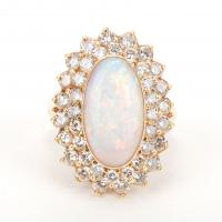 144-ROSETTE RING WITH DIAMONDS AND OPAL.