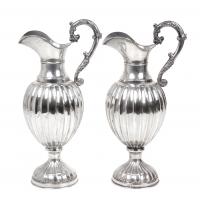 10-SET OF TWO SPANISH JUGS IN SPIRAL FLUTED SILVER, MID 20TH CENTURY.