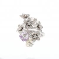 180-FLORAL RING WITH DIAMONDS AND QUARTZES.