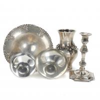 24-SPANISH SET CONSISTING OF A VASE, A CENTREPIECE, TWO BOWLS AND A CANDLESTICK IN SILVER, MID 20TH CENTURY.