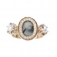 160-CAMEO RING SURROUNDED BY DIAMONDS.