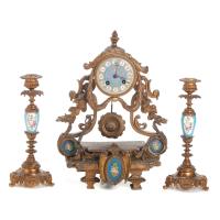 309-NAPOLEON III STYLE CLOCK WITH TWO CANDLESTICKS, FIRST HALF 20TH CENTURY.