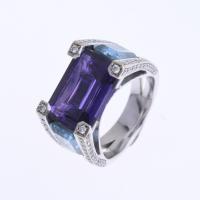 155-WHITE GOLD, DIAMONDS, TOPAZES AND AMETHYST RING.