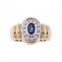 11-YELLOW GOLD RING WITH SAPPHIRE AND DIAMONDS.