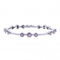 310-BRACELET WITH DIAMONDS AND ROSE SAPPHIRES FLOWERS.
