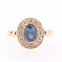 44-ROSETTE RING IN GOLD, SAPPHIRE AND DIAMONDS.