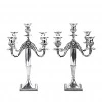 1-PAREJA DE CANDELABROS ESPAÑOLES EN PLATA, MED. SIGLO XX.