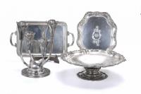 32-CENTREPIECE, CANDLESTICK AND TWO SPANISH TRAYS IN SILVER, MID 20TH CENTURY.