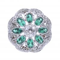 83-FLOWER RING WITH DIAMONDS AND GREEN BERYL.