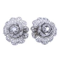 21-PAIR OF SMALL FLOWER BROOCHES IN PLATINUM WITH DIAMONDS.