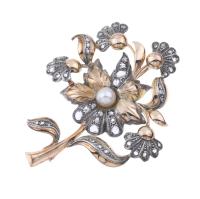22-NEEDLE BROOCH IN GOLD AND SILVER WITH DIAMONDS AND PEARL.