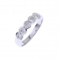 75-WHITE GOLD BAND RING WITH DIAMONDS.