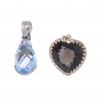 108-TWO PENDANTS IN WHITE AND YELLOW GOLD WITH TOPAZ AND QUARTZ.