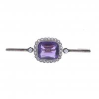 173-TWO-TONE BROOCH WITH NATURAL AMETHYST.