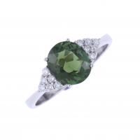 32-WHITE GOLD RING WITH GREEN TOURMALINE AND DIAMONDS.