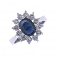 46-ROSETTE RING IN WHITE GOLD WITH DIAMONDS.