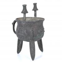 20-SACRIFICE VESSEL. AFTER MODELS OF ANCIENT "DING" RITUAL VESSELS PRESERVED FROM THE CHINESE BRONZE AGE, 20TH CENTURY.