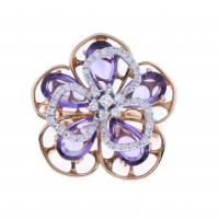 21-FLORAL RING WITH DIAMONDS AND AMETHYSTS.