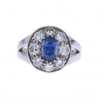 32-DIAMONDS AND SAPPHIRE ROSETTE RING.