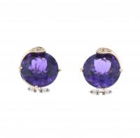 6-PENDEINTES CON TOPACIOS VIOLETAS.