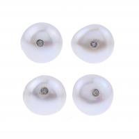 356-SET OF FOUR PEARL AND DIAMONDS BUTTONS.