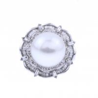 65-AUSTRALIAN PEARL AND DIAMONDS ROSETTE RING.