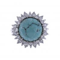 102-J. ROCA. RING WITH DIAMONDS AND TURQUOISE.