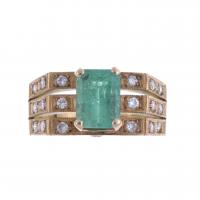 87-RING WITH EMERALD AND DIAMONDS.