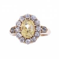 34-ROSETTE RING WITH CITRINE AND DIAMONDS.