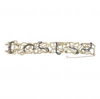 244-GOLD AND SILVER WIDE BRACELET.