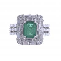 91-LARGE RING WITH DIAMONDS AND EMERALDS.