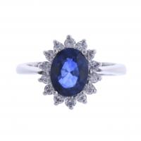 68-ROSETTE RING WITH DIAMONDS AND SAPPHIRE.