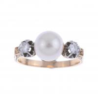 15687-EARLY 20TH CENTURY RING WITH PEARL AND DIAMONDS.