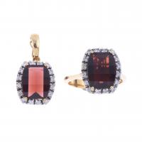 255-PENDANT AND RING WITH GARNET AND DIAMONDS.