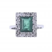 80-EMERALD AND DIAMONDS RING.