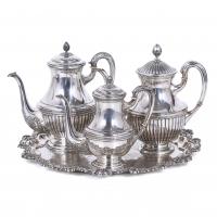 27-SET OF THREE EDWARDIAN STYLE TEAPOTS AND A TRAY, 20TH CENTURY. 