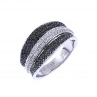62-WAVY RING WITH BLACK AND WHITE DIAMONDS.