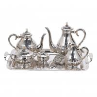 28-SILVER AND BONE COFFEE AND TEA SET, 20TH CENTURY.