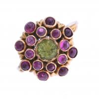 83-RUBIES AND GREEN TOURMALINE ROSETTE RING.