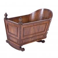 669-ROCKING CRADLE, AFTER FRENCH MODELS OF THE 17TH CENTURY. MADE IN THE EARLY 20TH CENTURY.